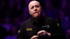 Higgins beaten by teenager Moody in 2,000th match